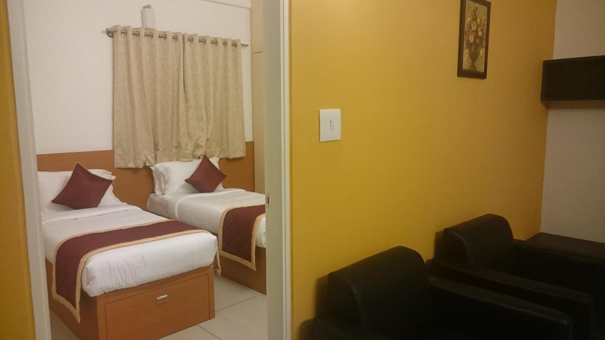 เอสเอพี โกลเดน กรันเด Hotel Kammasandra ห้อง รูปภาพ